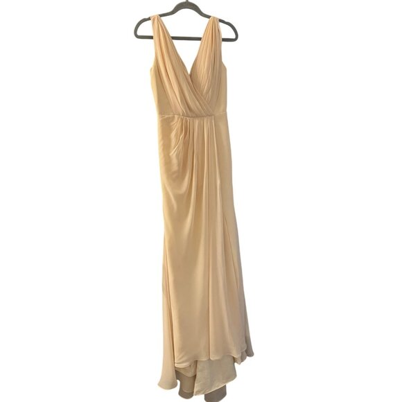 Elegant Floor-Length Cream Gown With Pleated V-Neckline & Flowing Hemline Sleeve - Picture 1 of 5
